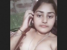 Teen girl in sexy lingerie pleasures herself with her shaved pussy