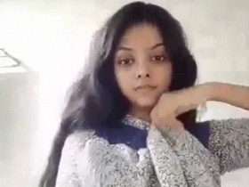 Desi beauty strips naked in the bathroom for a solo masturbation session
