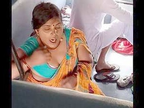 Busty Desi bhabi flaunts her curves on the train