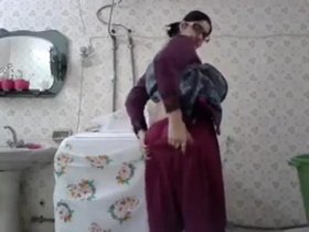 Gorgeous girlfriend in the bathroom getting naughty