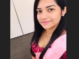 Heena, a cute teen, gets her hair clipped in this video