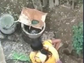 Rural girl relieves herself in the open