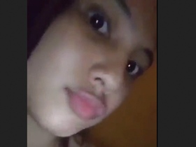 Adorable teen girl shows off her wet pussy closeup
