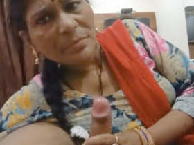 Mature Desi bhabi gives a blowjob and gets fucked in Part 1