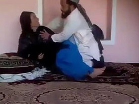 Older man and younger woman engage in sexual activity