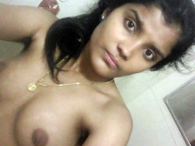A young girl pleasures herself with her phone in a steamy video