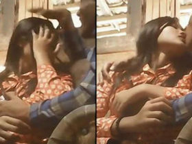 Lovers indulge in passionate kissing and boob play in a restoration room