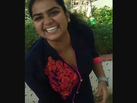 Indian college student Priya gives a blowjob to her boyfriend on the stairs