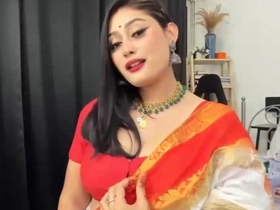 Anna's seductive performance in a colorful sari: A captivating video
