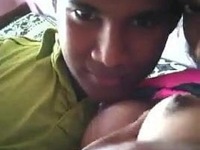 Sri Lankan teen strengthens her boob kissing skills