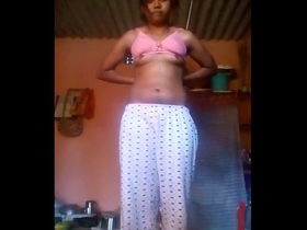 Desi teen strips down to her lingerie in the village