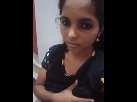 College girl flaunts her big breasts in a hot video shoot