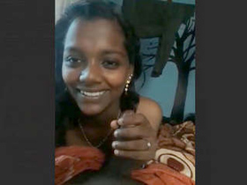 A charming Tamil girl gives a sensual blowjob in a steamy video