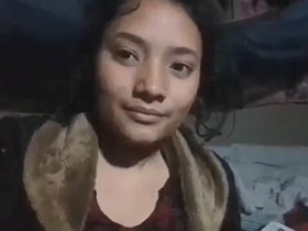 Young Indian girl flaunts her large breasts and intimate area in a sizzling video
