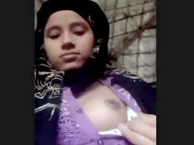 Indian babe reveals her small breasts and intimate parts