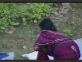 Indian wife with big breasts gets wild in a village porn video